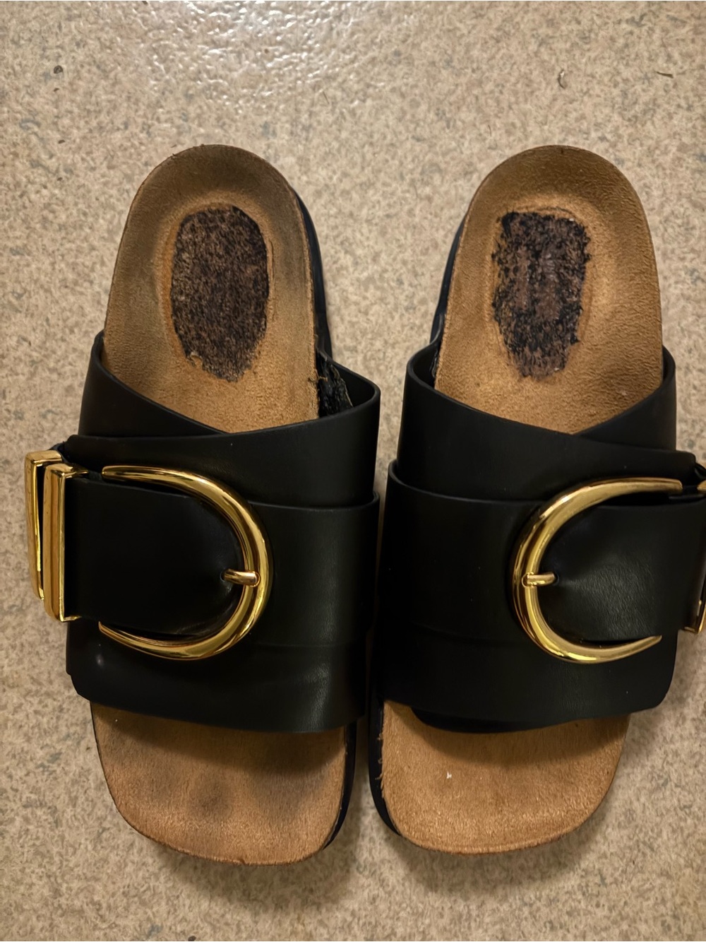 KHAITE Black Leather Slide Mules with Gold Buckle